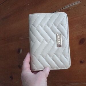 NWOT Beige Quilted Bebe Clutch